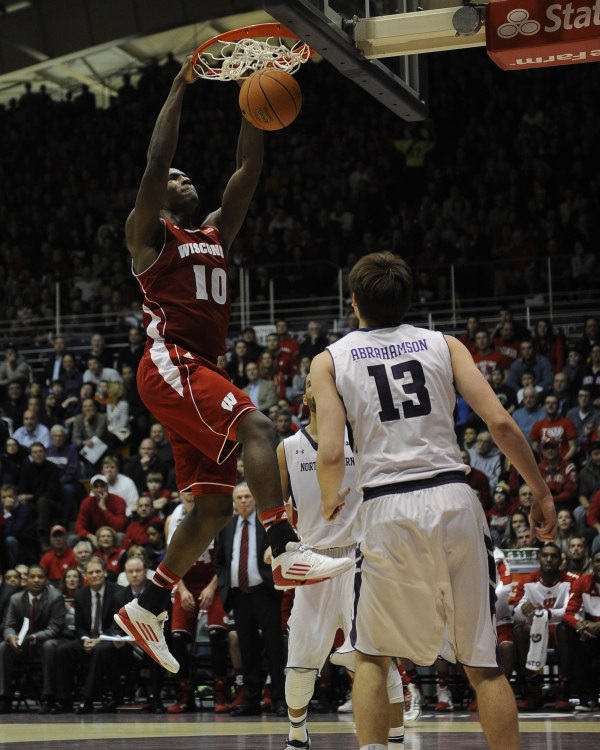 Wisconsin Badgers forward Nigel Hayes (10) dunks as Northwestern Wildcats forward Kale Abrahamson (13) looks on. David Banks - USA TODAY