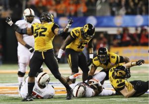 Missouri defensive lineman Michael Sam (52) reacts after a play against Oklahoma State.