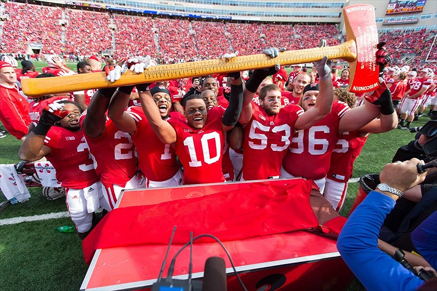 Oct 20, 2012; Madison, WI, USA; The Wisconsin Badgers celebrate with the Paul Bunyan Axe following the game against the Minnesota Golden Gophers at Camp Randall Stadium. Wisconsin defeated Minnesota 38-13. PHOTO: Jeff Hanisch-USA TODAY Sports