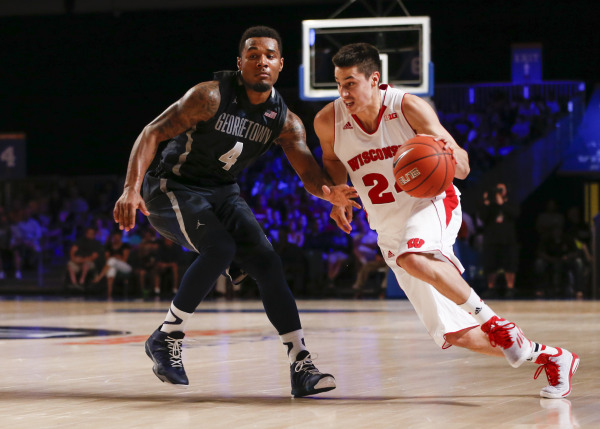 Wisconsin guard Bronson Koenig (24) drives past Georgetown guard D'Vauntes Smith-Rivera (4). PHOTO: Kevin Jairaj, USA TODAY