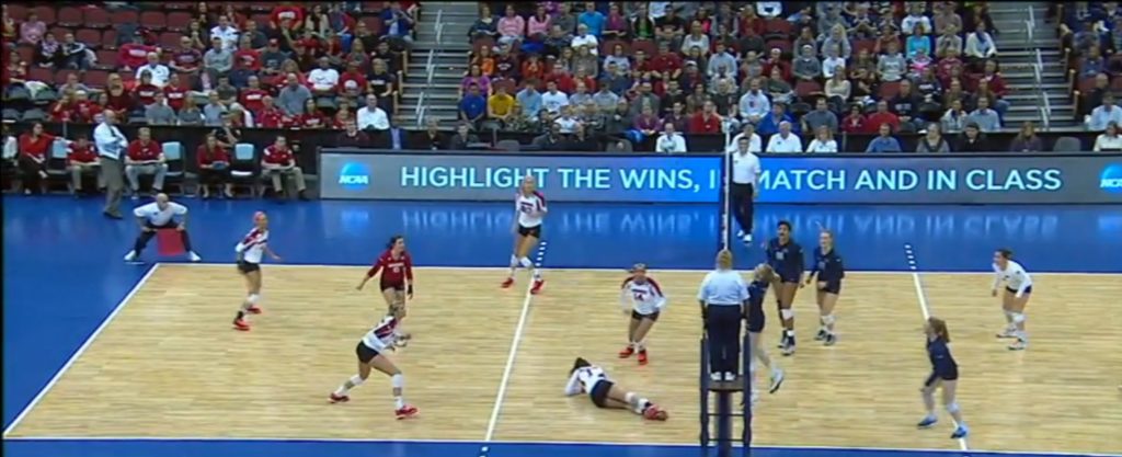 Wisconsin setter Lauren Carlini injures her ankle in the first set of the NCAA quarterfinals match against Penn State.