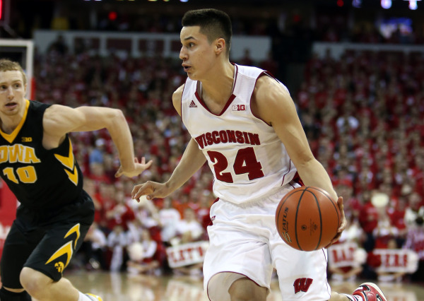 Wisconsin's Bronson Koenig (24) brings the ball down the floor as Iowa's Mike Gesell (10) defends at the Kohl Center. PHOTO: Mary Langenfeld, USA TODAY