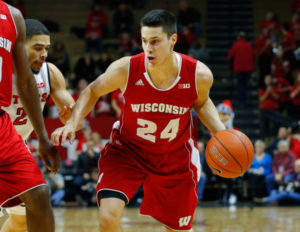 Wisconsin guard Bronson Koenig (24) brings the ball up court during the first half against the Rutgers . PHOTO: Jim O'Connor, USA TODAY