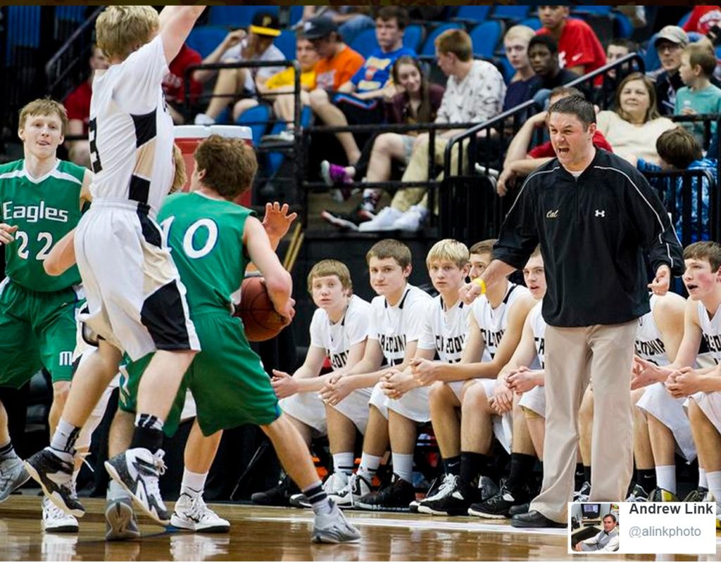 Caledonia coach Josh Diersen either very happy or upset with the way his team is defending Maple River in the state semis at the Target Center. PHOTO: Andrew Link / ALinkPhoto on Twitter