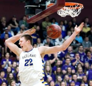 Rice Lake's Henry Ellenson reacts after dunking the ball during Thursday's WIAA Division 2 sectional semifinal against Onalaska in Menomonie, Wis. PHOTO: Marisa Wojcik/Eau Claire Leader Telegram