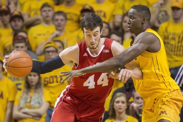 Wisconsin forward Frank Kaminsky (44) drives on Minnesota center Bakary Konate (21) in the second half at Williams Arena. PHOTO: Jesse Johnson, USA TODAY