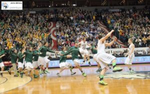 Rushford-Peterson storms the court after winning the Minnesota state Class A title on March 3, 2015 at the Target Center. PHOTO: John Millea / MSHSL