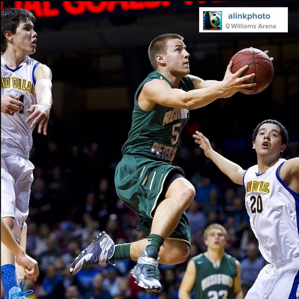 Rushford-Peterson's Alex Vix, middle, drives to the basket for a layup past Fond du Lac Ojibwe's Dexter Delille (34) and Justin Brown (20) during a MSHSL Class A Boys Basketball Tournament quarterfinal game Thursday, March 12, 2015, at Williams Arena in Minneapolis. PHOTO: Andrew Link/Winona Daily News